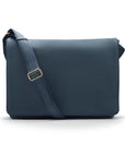 Men's large leather messenger bag, navy pebble grain, front