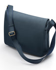 Men's large leather messenger bag, navy pebble grain, side