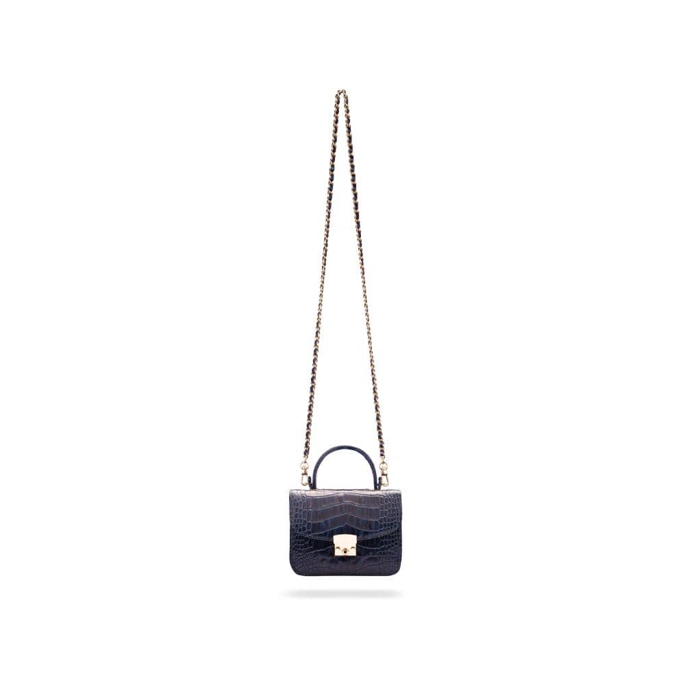 Small leather top handle bag, navy croc, with long chain strap