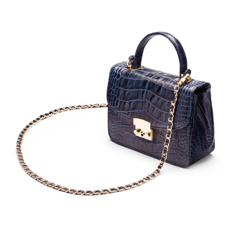 Small leather top handle bag, navy croc, side