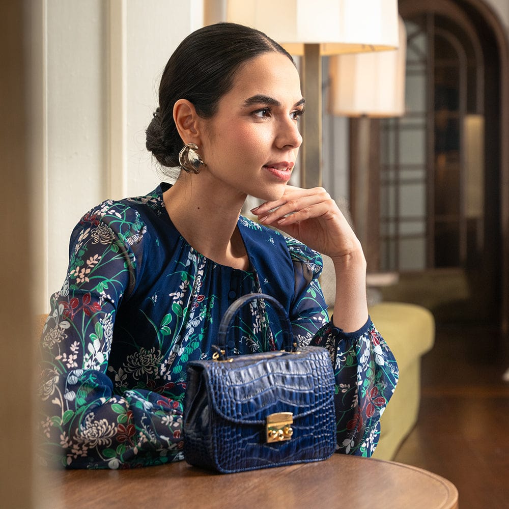 Small leather top handle bag, navy croc, lifestyle