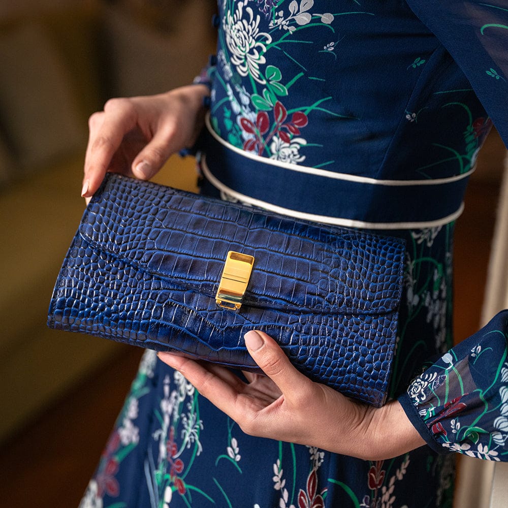 Leather clutch bag, navy croc, lifestyle view