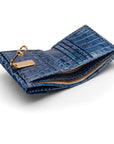 Leather purse with brass clasp, navy croc, inside