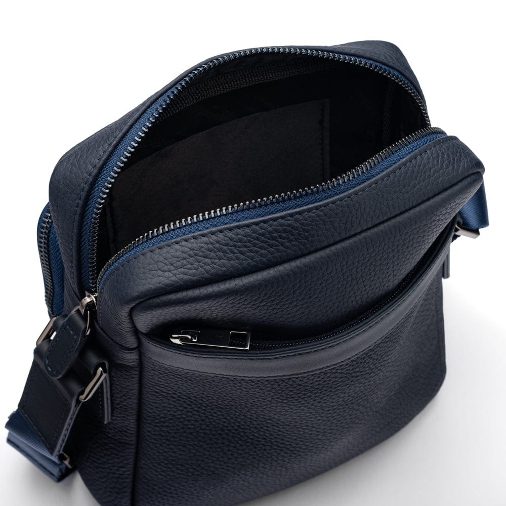 Leather messenger bag with zip, navy, open back view