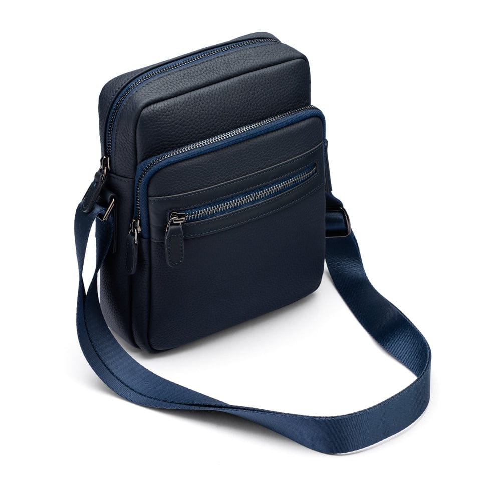 Leather messenger bag with zip, navy, side view