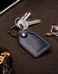 Rectangular leather key fob, navy, lifestyle