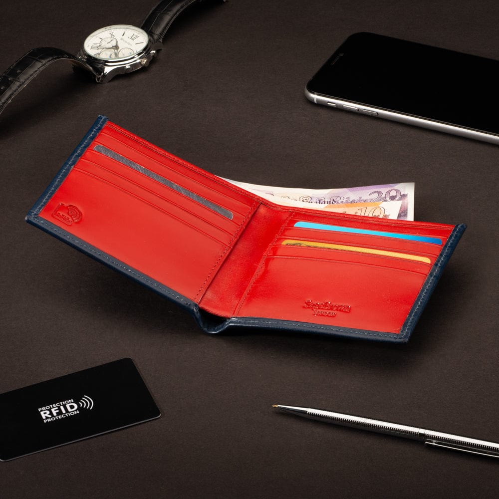 RFID wallet in bridle hide leather, navy with red, lifestyle