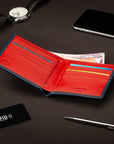 RFID wallet in bridle hide leather, navy with red, lifestyle