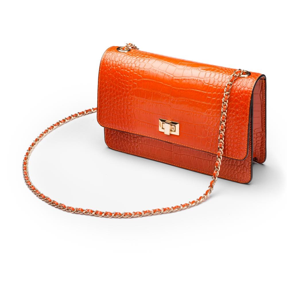 Leather chain bag, orange croc, side view