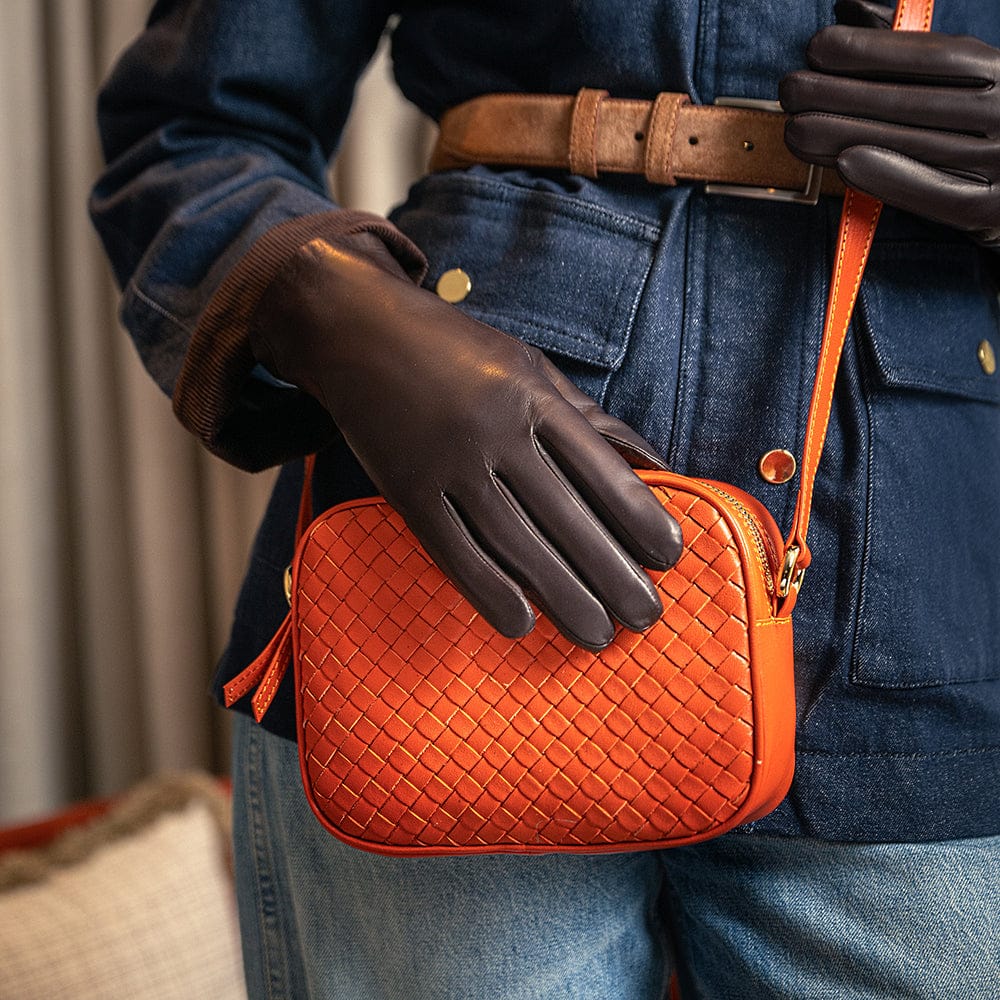 Ivy woven camera bag, orange, lifestyle