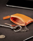 Miniature leather coin purse with key chain, orange, lifestyle