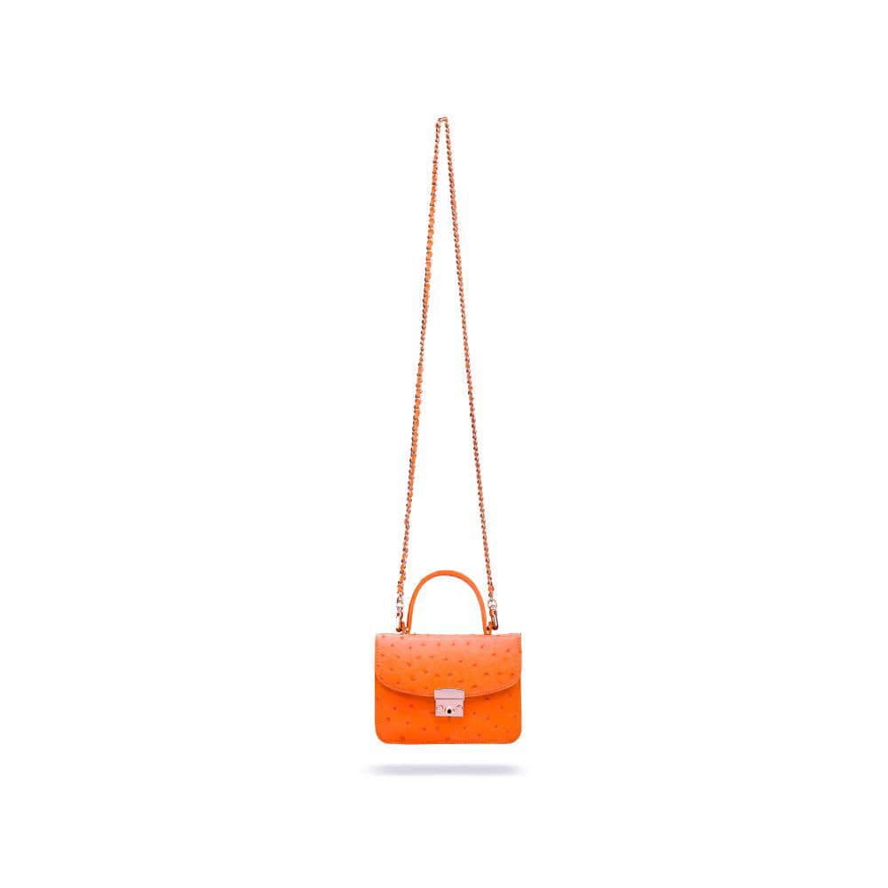 Small ostrich leather top handle bag, orange ostrich, with long chain strap