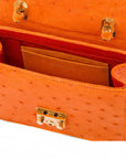 Small ostrich leather top handle bag, orange ostrich, inside