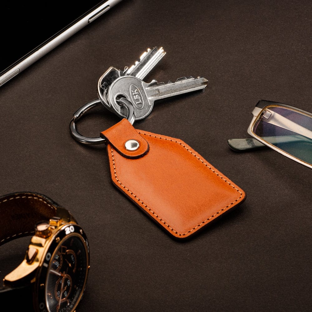 Rectangular leather key fob, orange, lifestyle