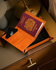 RFID leather passport holder, orange, lifestyle view