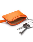 Small leather coin purse with key chain, orange, inside