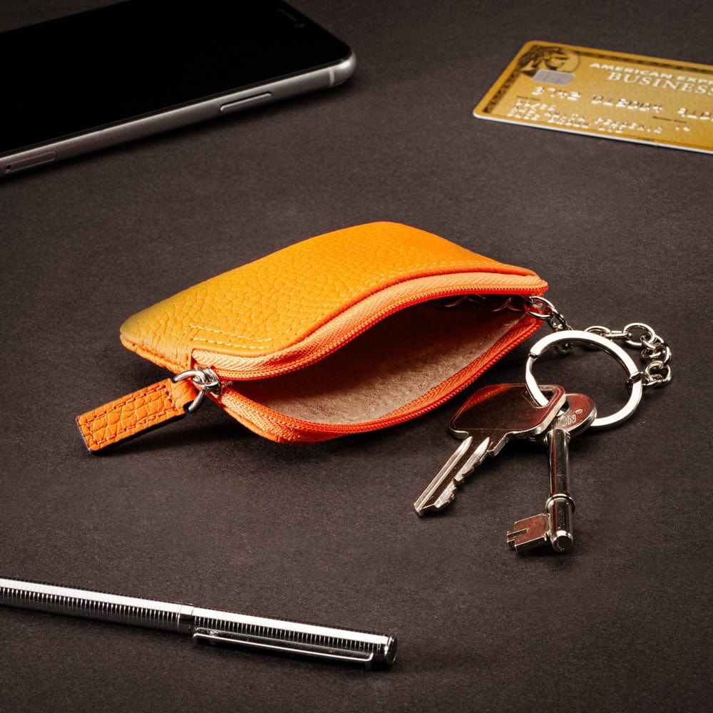 Small leather coin purse with key chain, orange, lifestyle