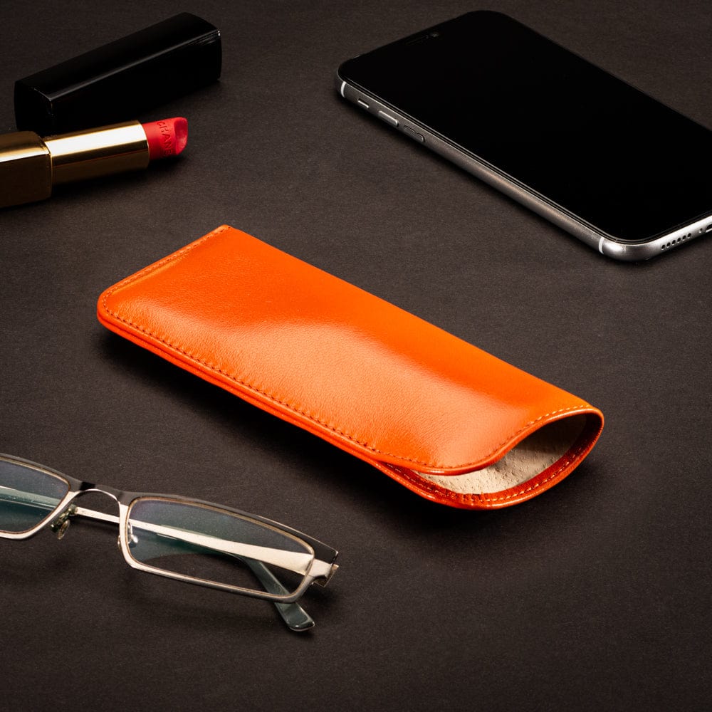 Small leather glasses case, soft orange, lifestyle