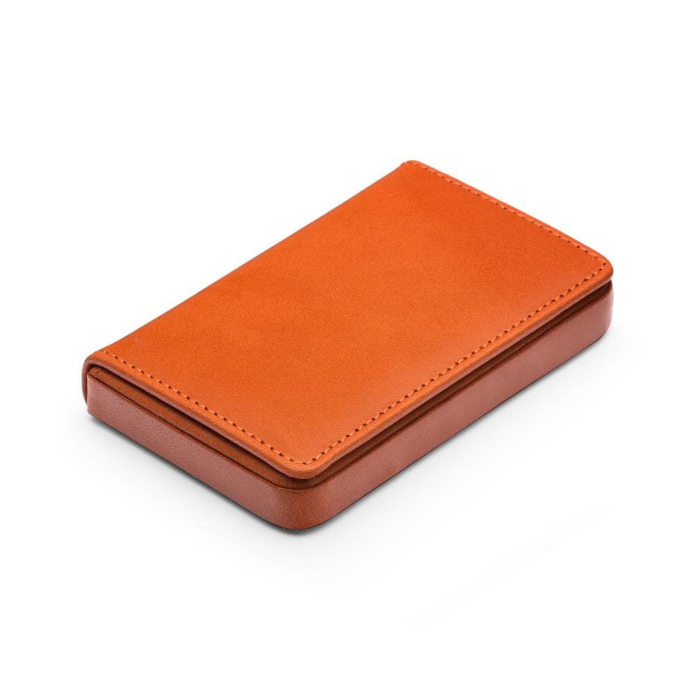 Leather business card holder with magnetic closure, orange, side