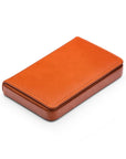 Leather business card holder with magnetic closure, orange, side