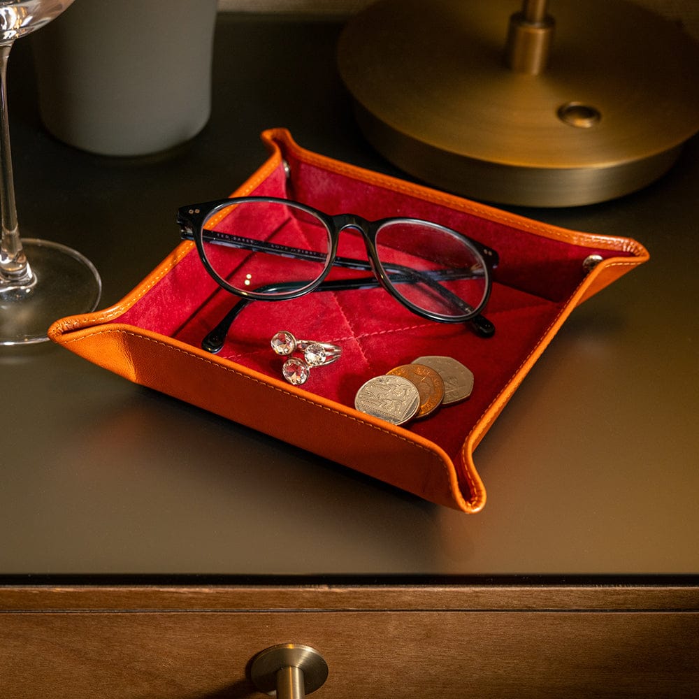 Leather valet tray, orange with red, lifestyle
