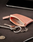 Miniature leather coin purse with key chain, pink, lifestyle