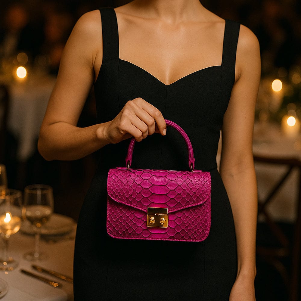 Small real python top handle bag, pink, lifestyle