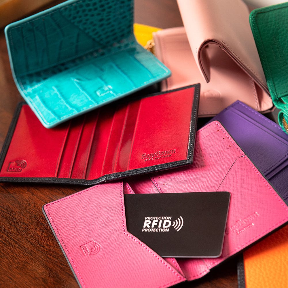RFID bifold credit card holder, pink saffiano, lifestyle