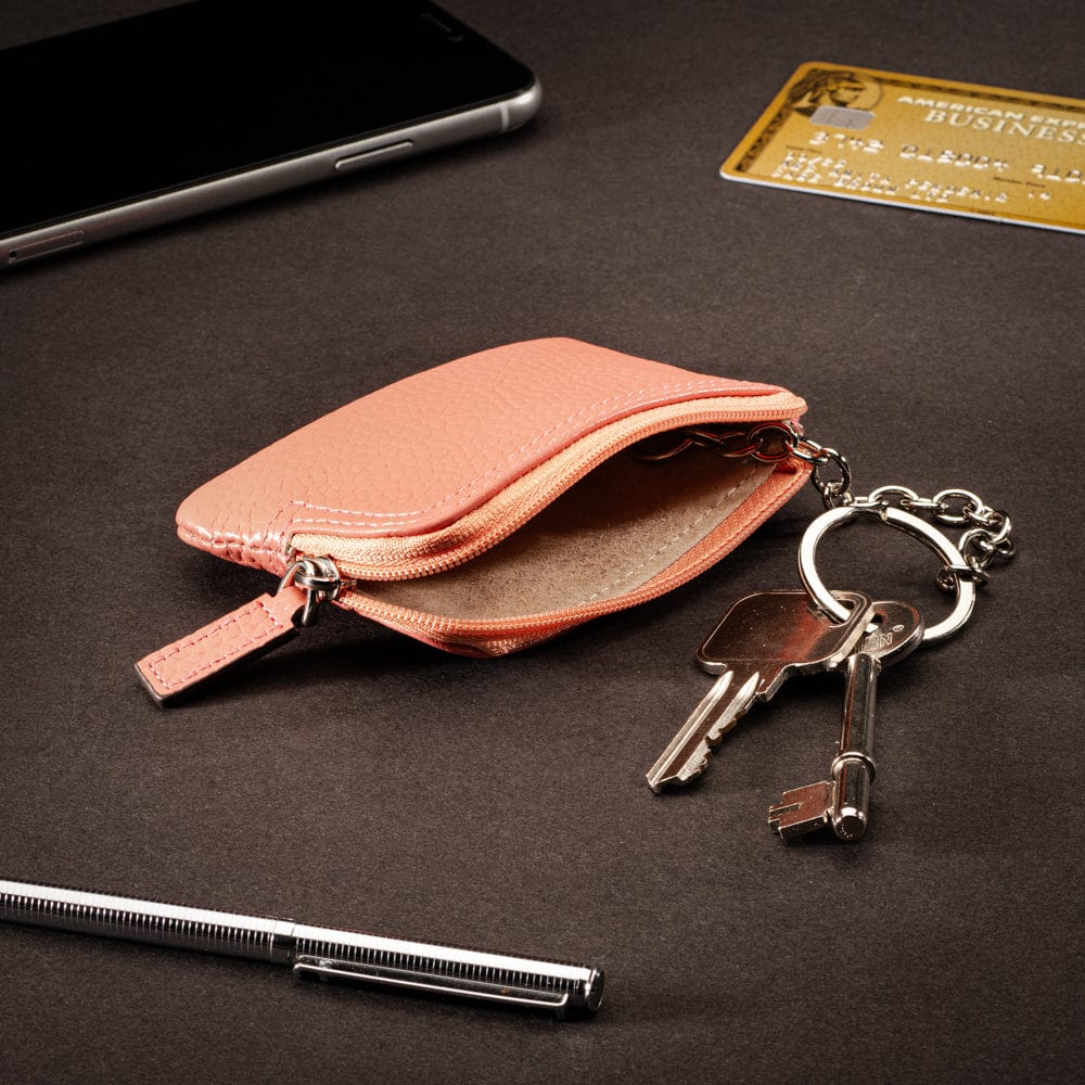 Small leather coin purse with key chain, pink, lifestyle