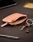 Small leather coin purse with key chain, pink, lifestyle