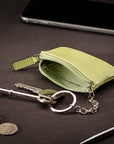 Miniature leather coin purse with key chain, pistachio green, lifestyle