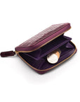 Small leather zip around accordion coin purse, dark purple croc, interior