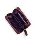 Small leather zip around accordion coin purse, dark purple croc, open