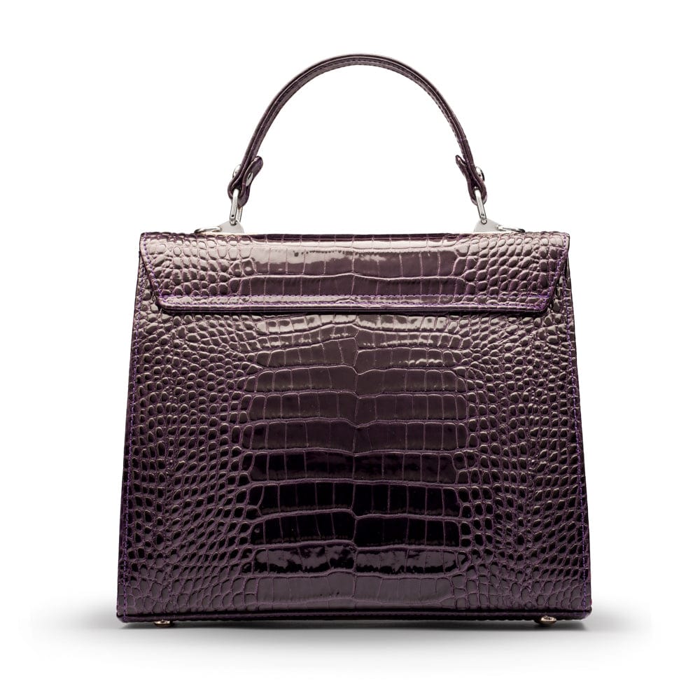 Leather Catherine top handle bag, purple patent croc, back