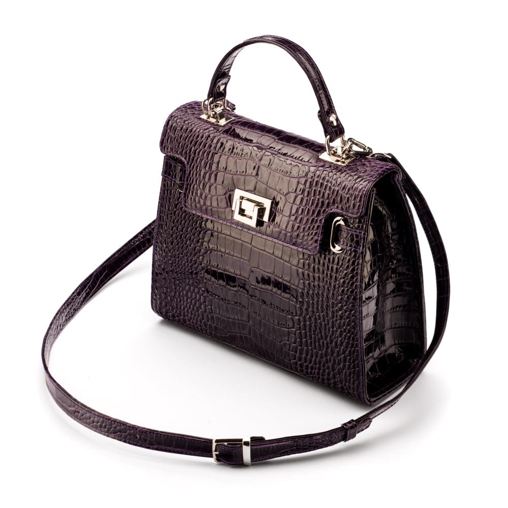 Leather Catherine top handle bag, purple patent croc, side