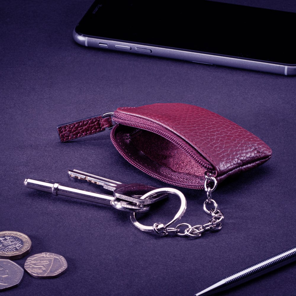 Miniature leather coin purse with key chain, purple, lifestyle