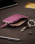 Small leather coin purse with key chain, purple, lifestyle