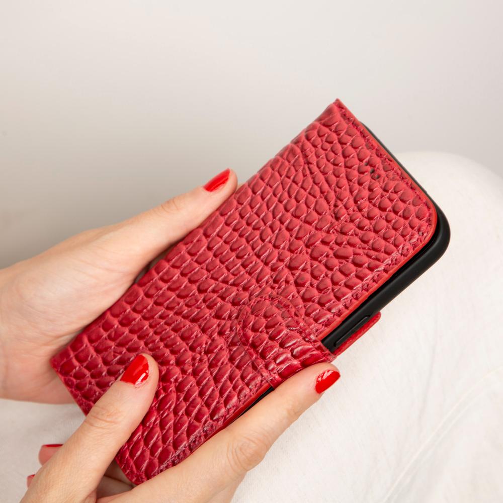 iPhone 15 Pro case in leather with RFID, red croc, lifestyle view