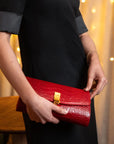 Leather clutch bag, red croc, lifestyle view