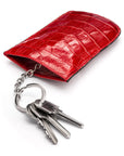 Leather key case with squeeze spring opening, red croc, open