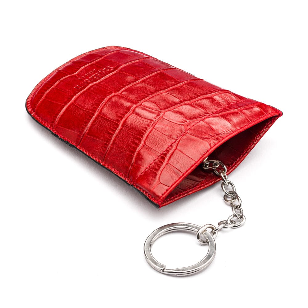 Leather key case with squeeze spring opening, red croc, back