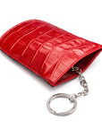 Leather key case with squeeze spring opening, red croc, back