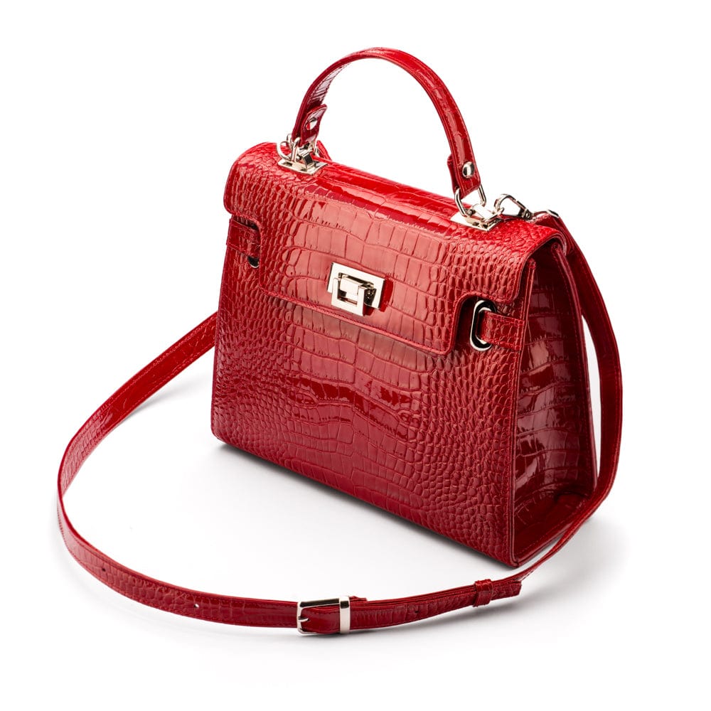 Leather Catherine top handle bag, red patent croc, side