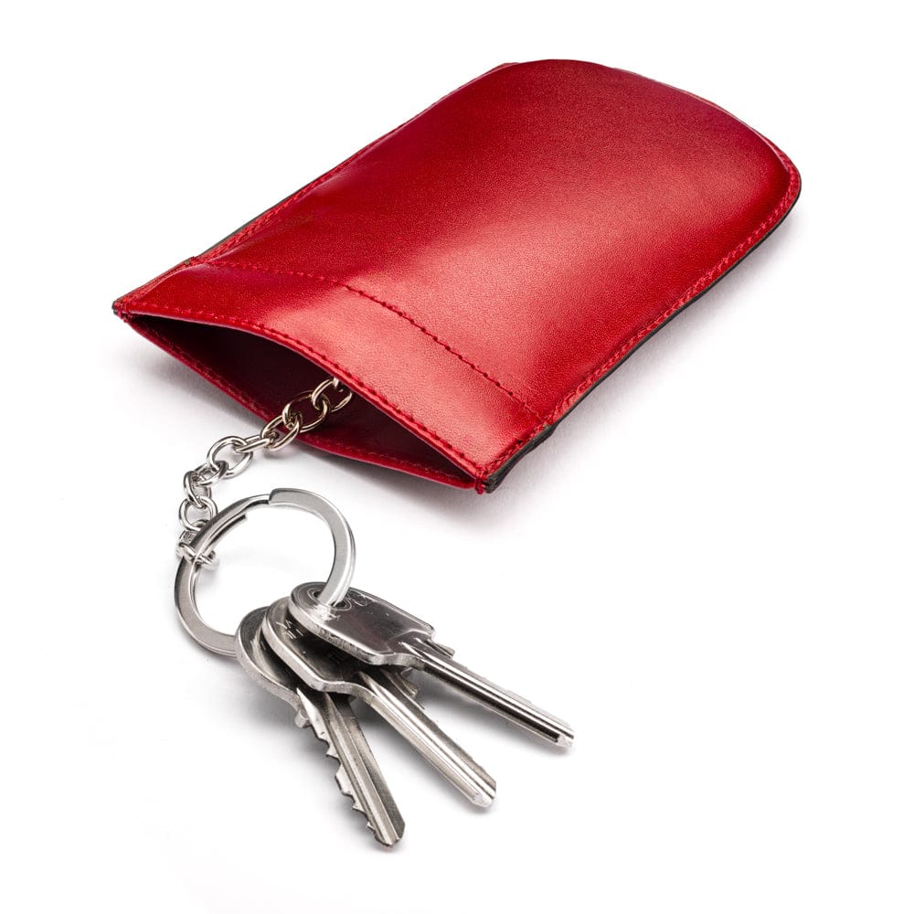 Leather key case with squeeze spring opening, red, open