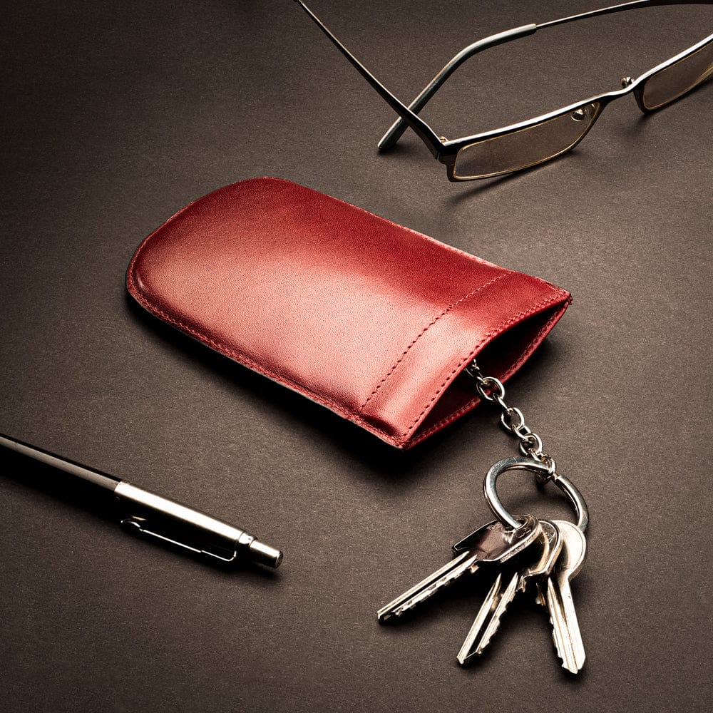 Leather key case with squeeze spring opening, red, lifestyle