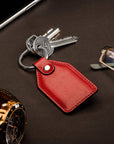 Rectangular leather key fob, red, lifestyle