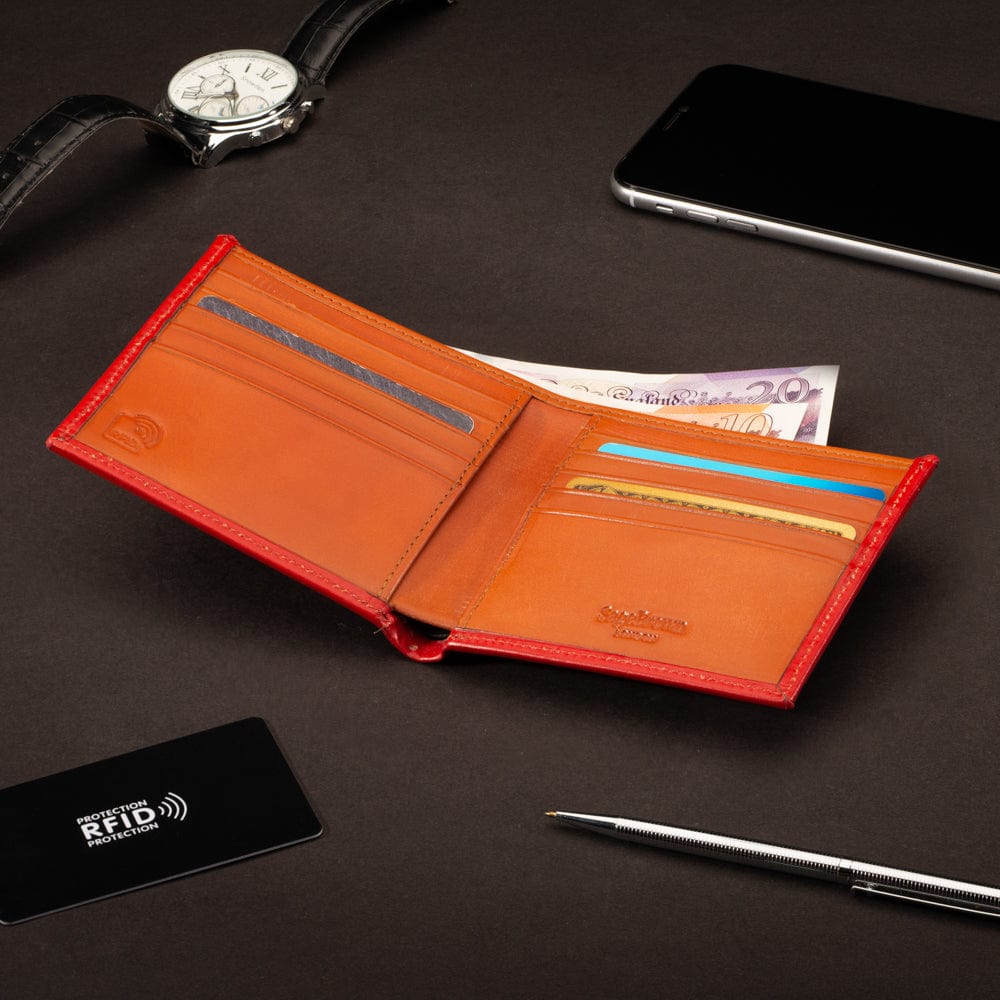 RFID wallet in bridle hide leather, red with orange, lifestyle