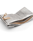 Leather purse with brass clasp, silver croc, inside