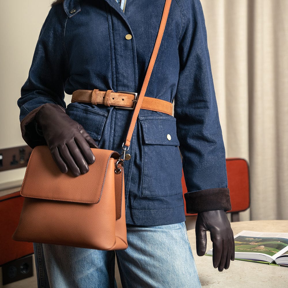 Leather handbag with flap over lid, tan, worn across the body