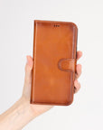 iPhone 16 Pro case in leather with RFID, tan, lifestyle